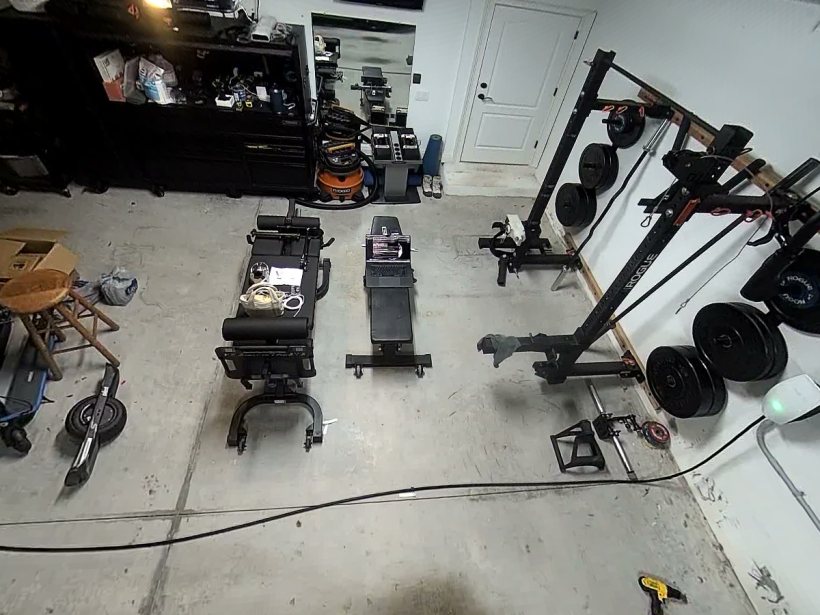 The same frame rectified into a normal-looking wide-angle view of the gym, floor joints straight